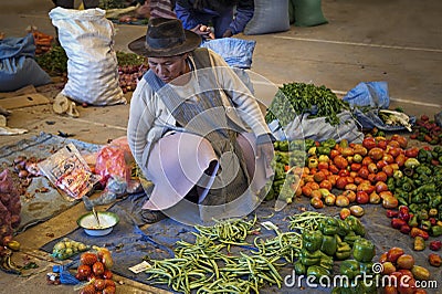 Unidentified indigenous native Quechua woman with traditional tribal clothing and hat, at the Tarabuco Sunday Market, Bolivia Editorial Stock Photo